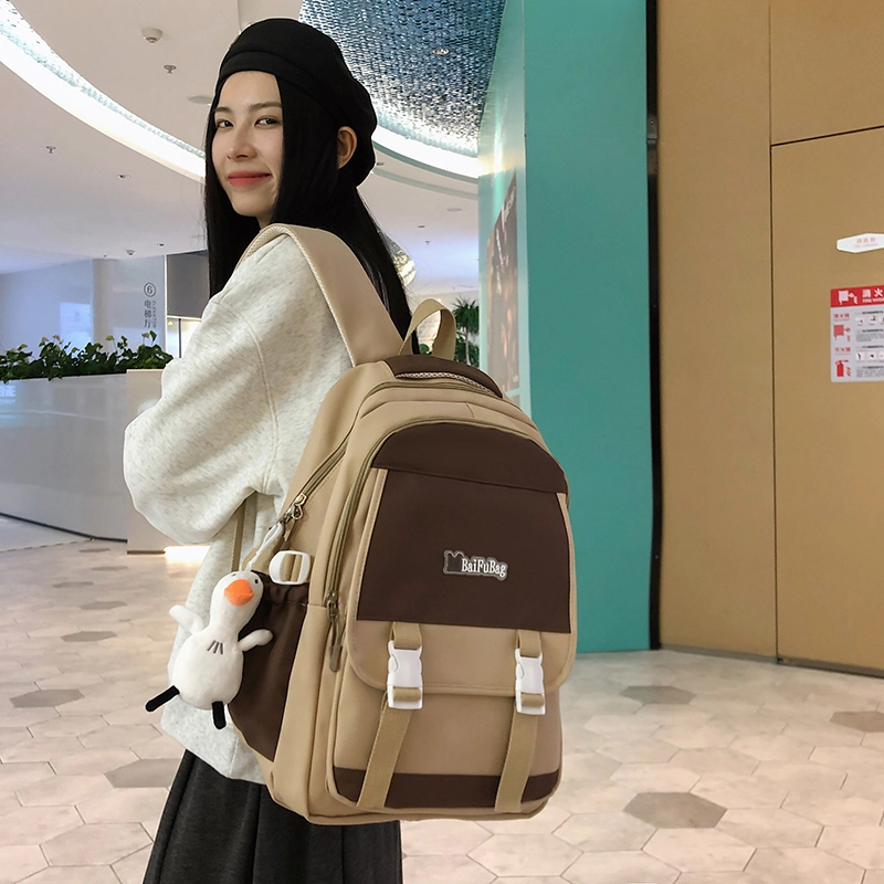 德力熊 带挂件休闲大容量简约百搭轻便拉链开合 尼龙 书包背包双肩包 常规 女款 黑色/红色/卡其色/蓝色