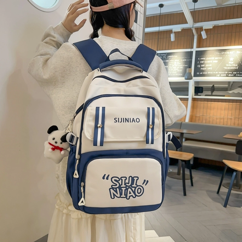 德力熊双肩包女初中女生大容量高中生小学生尼龙高颜值五六年级书包减负背包男女通用 多色