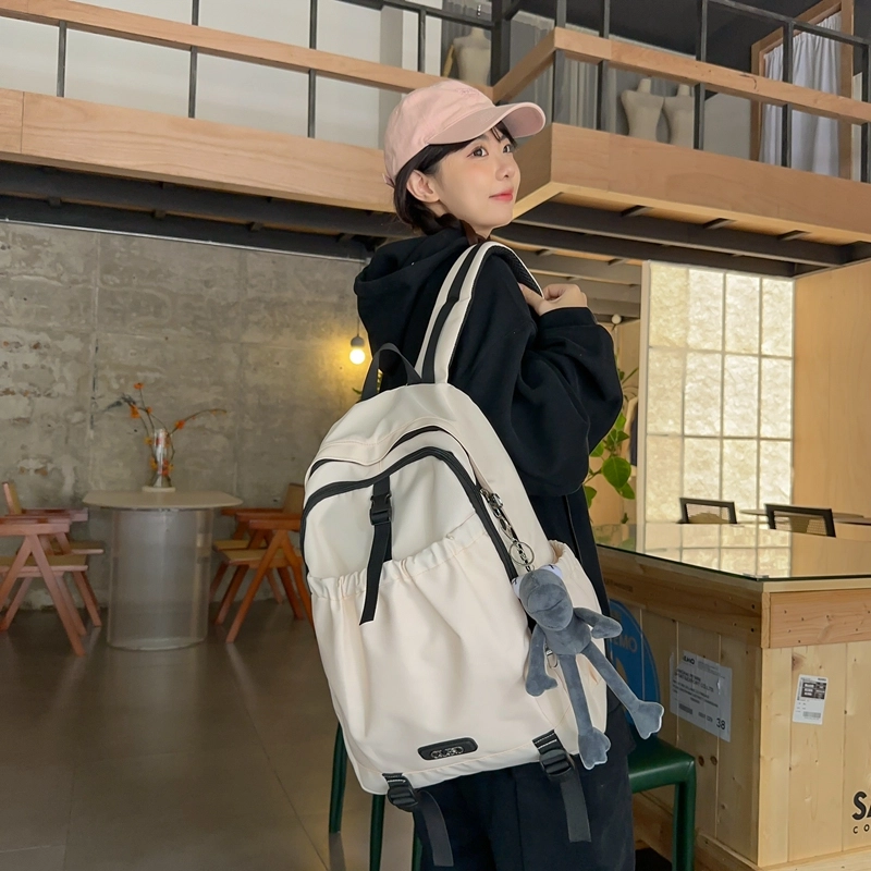 德力熊 轻便百搭简约大容量通用 尼龙 背包双肩包 常规 男女同款情侣款 黑色/粉色/白色/灰色