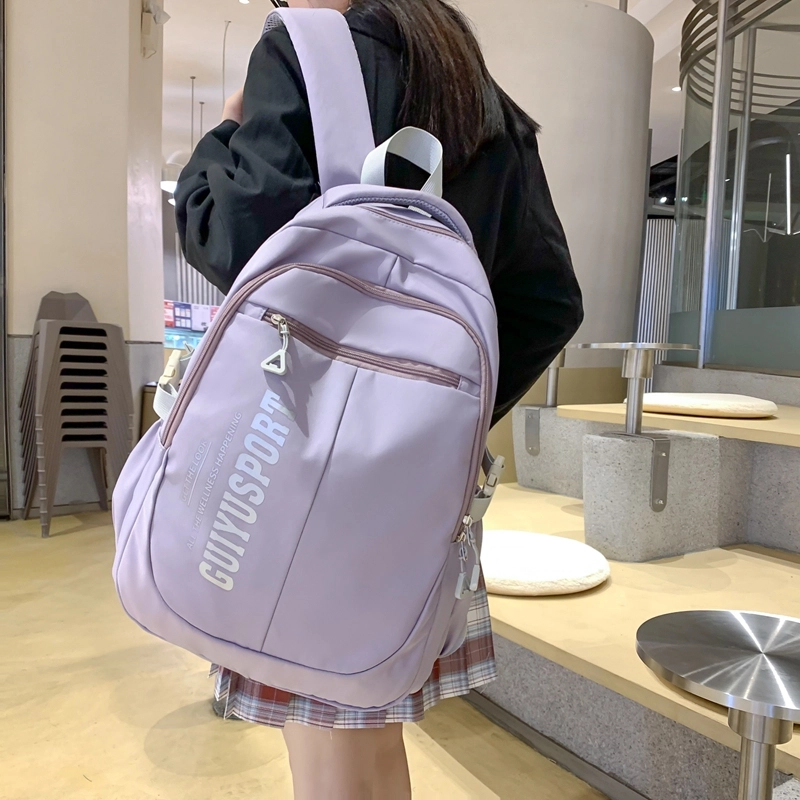 德力熊尼龙书包男女通用多色初中高中生大容量潮牌背包轻便简约大学生双肩包