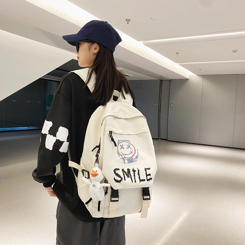 德力熊 轻便休息时尚百搭 尼龙 书包背包双肩包 常规 男女同款情侣款 黑色大牙/白色大牙/白色笑脸/白色笑脸