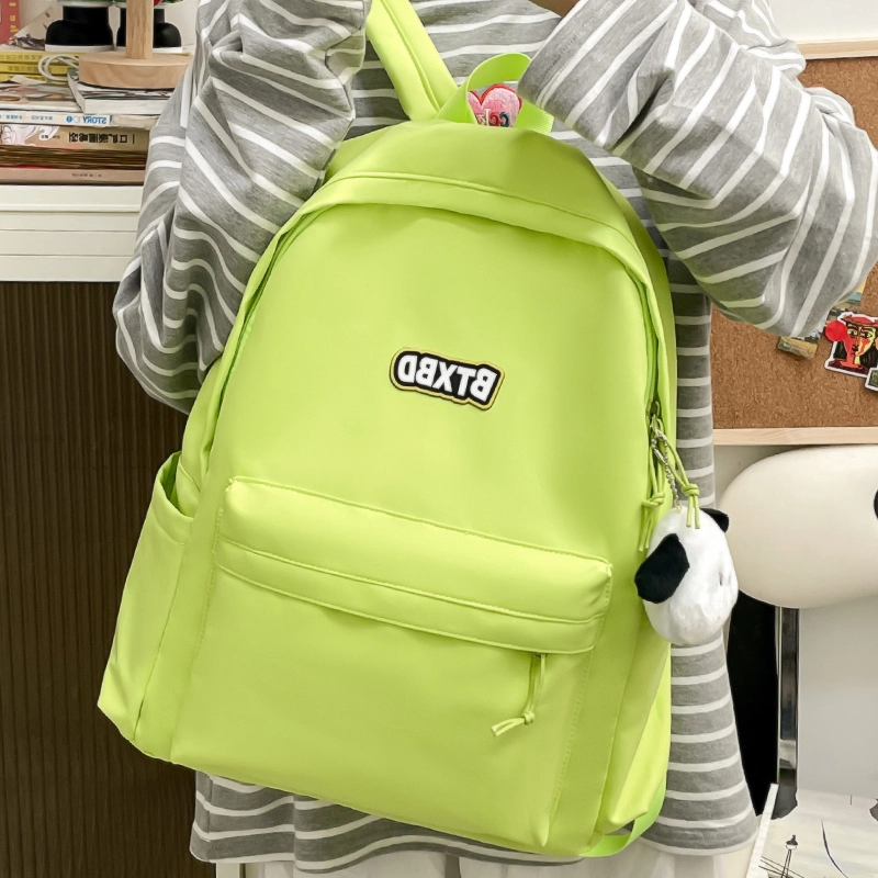 德力熊  尼龙男女通用多色高颜值学生书包纯色大容量双肩包尼龙简约百搭小众背包