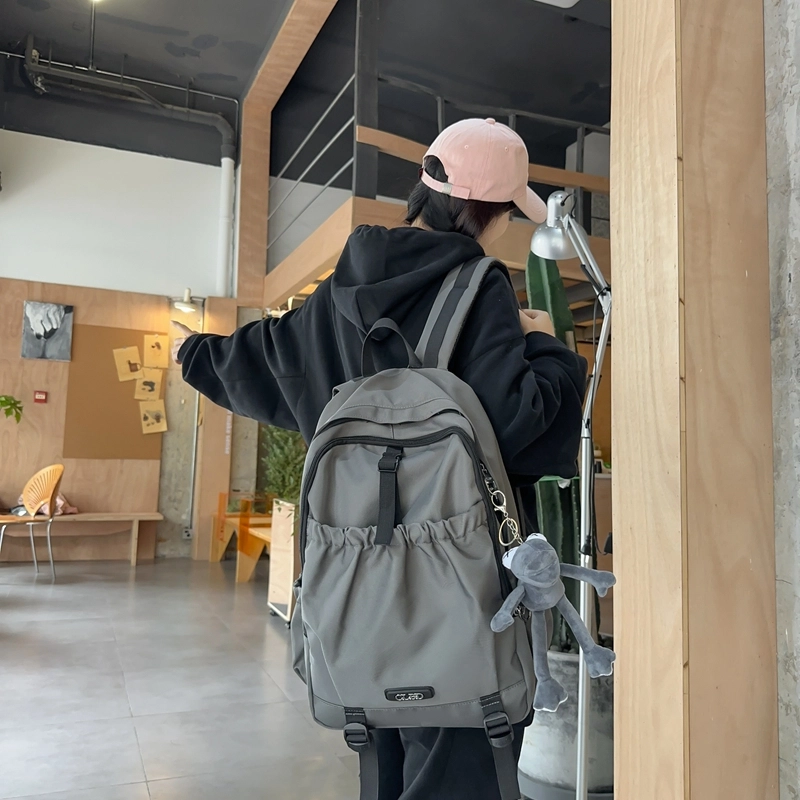 德力熊 轻便百搭简约大容量通用 尼龙 背包双肩包 常规 男女同款情侣款 黑色/粉色/白色/灰色