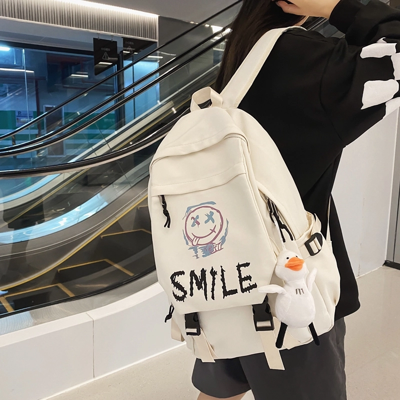 德力熊 轻便休息时尚百搭 尼龙 书包背包双肩包 常规 男女同款情侣款 黑色大牙/白色大牙/白色笑脸/白色笑脸