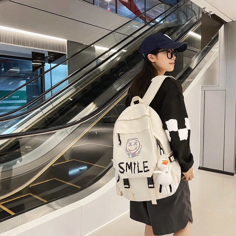 德力熊 轻便休息时尚百搭 尼龙 书包背包双肩包 常规 男女同款情侣款 黑色大牙/白色大牙/白色笑脸/白色笑脸