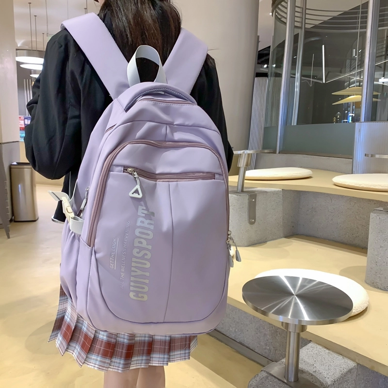 德力熊尼龙书包男女通用多色初中高中生大容量潮牌背包轻便简约大学生双肩包