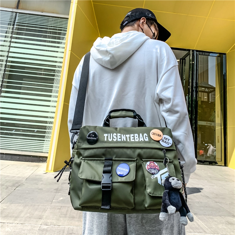德力熊单肩包运动旅行包斜挎简约尼龙工装包男女通用情侣款 多色
