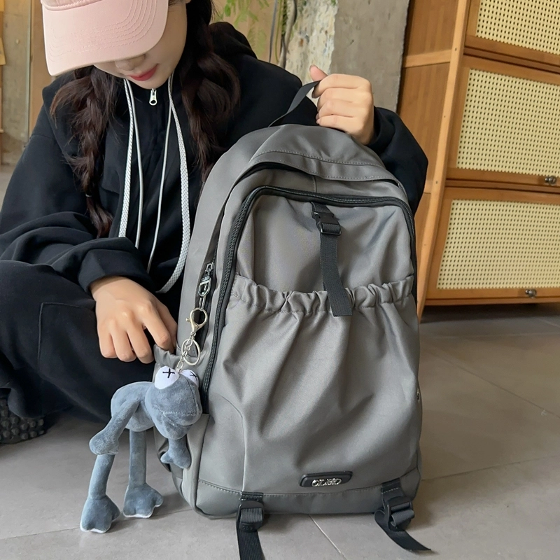 德力熊 轻便百搭简约大容量通用 尼龙 背包双肩包 常规 男女同款情侣款 黑色/粉色/白色/灰色