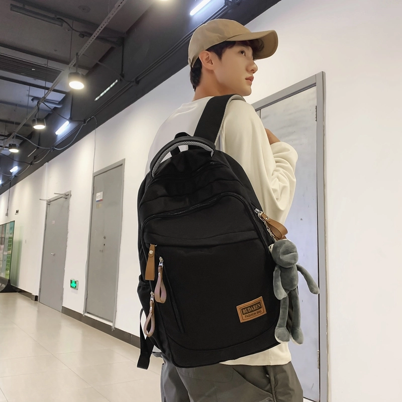 德力熊 潮牌大容量防水轻便多口袋 尼龙 书包背包双肩包 常规 男女同款情侣款 米白色/灰色/红色/蓝色/黑色