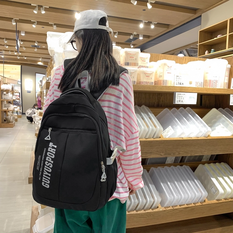 德力熊尼龙书包男女通用多色初中高中生大容量潮牌背包轻便简约大学生双肩包