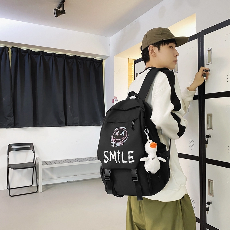 德力熊 轻便休息时尚百搭 尼龙 书包背包双肩包 常规 男女同款情侣款 黑色大牙/白色大牙/白色笑脸/白色笑脸