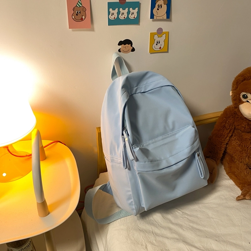 德力熊 纯色大容量书包背包简约通勤轻便旅行 尼龙 双肩包 常规 男女同款情侣款 黑色/蓝色/绿色/粉色/白色