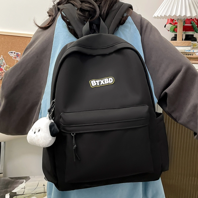 德力熊  尼龙男女通用多色高颜值学生书包纯色大容量双肩包尼龙简约百搭小众背包