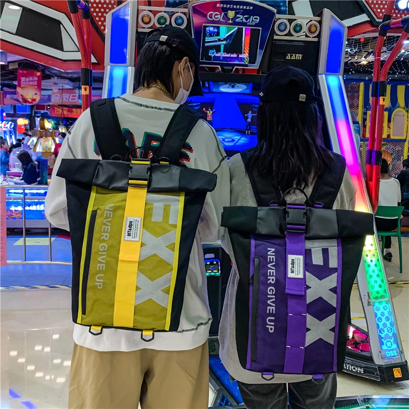 德力熊 潮牌休闲时尚大容量轻便 牛津布 书包背包双肩包 男女同款情侣款 黄色/蓝色/紫色/红色