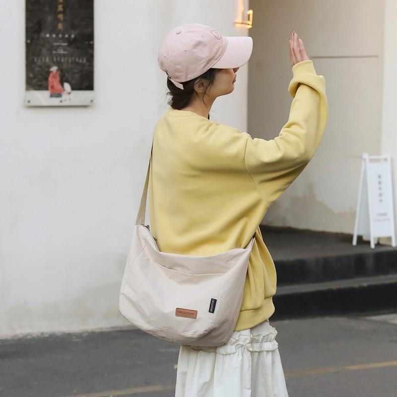 德力熊 尼龙 男女通用 多色 单肩包 日系纯色斜挎学生书包防水轻便大容量包