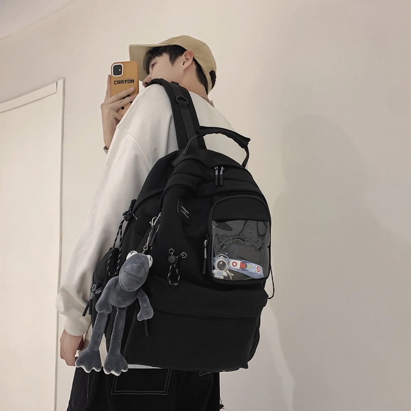 泰克森 大容量简约出行背包 尼龙 双肩包 男女同款情侣款 白色/黑色