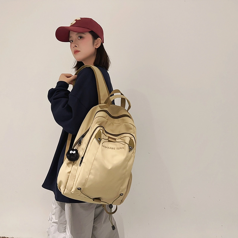 泰克森 时尚休闲 尼龙 双肩包 大号 男女同款情侣款 米白色/黑色/卡其色/蓝色