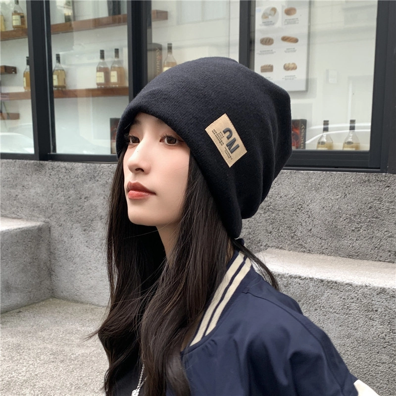 优幽兰 韩版显脸小纯色设计感贴标防风防寒冷帽加厚保暖高级感小众 棉 绒线帽 女款