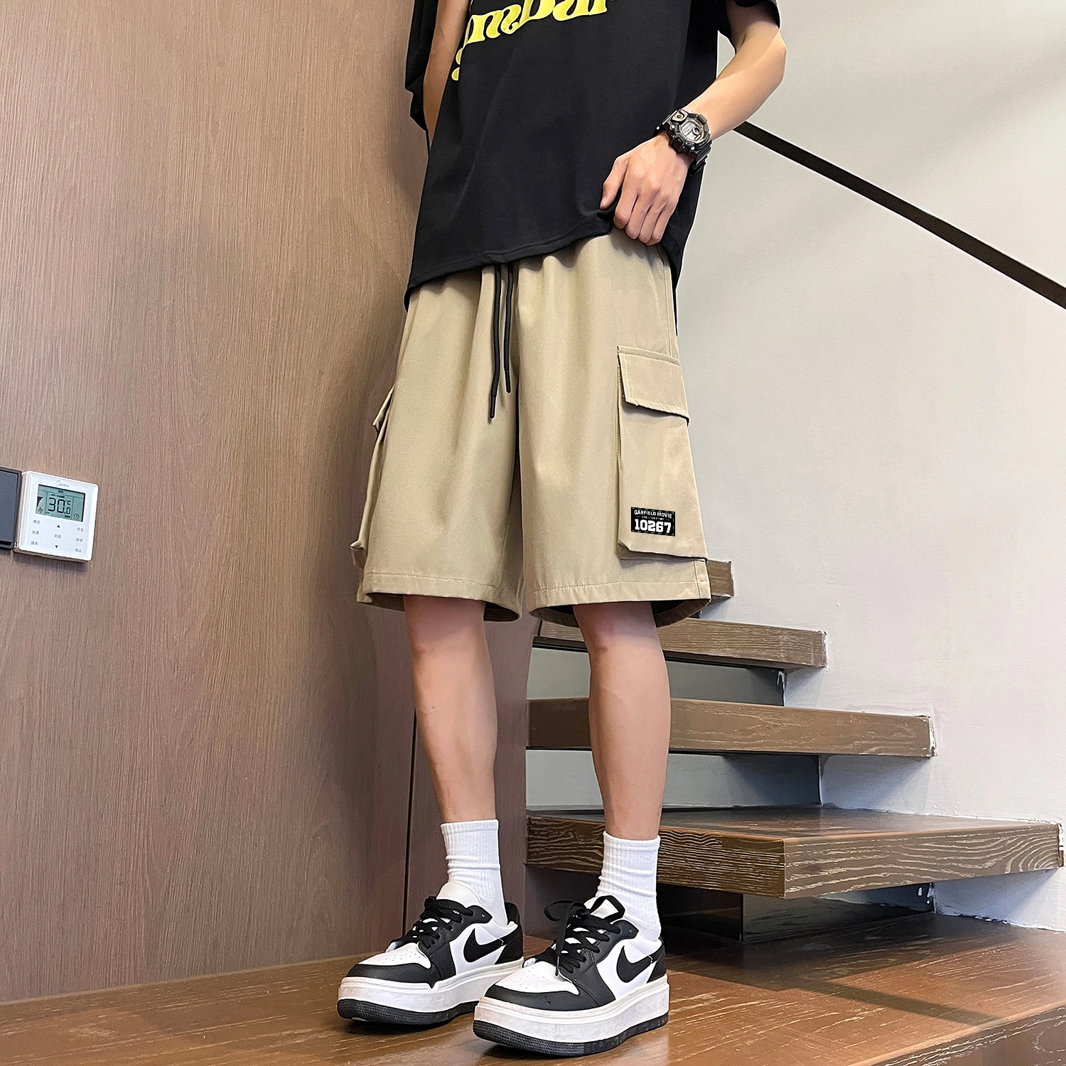 加菲猫家族 美式简约纯色基础宽松舒适大口袋烧花设计时尚潮流街头酷帅五分直筒垂感轻薄透气排汗系带中腰工装短裤 男女同款