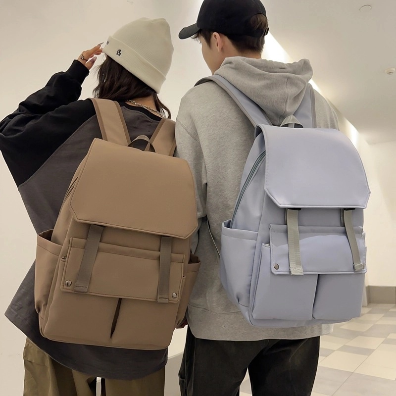泰克森 开学季初中生纯色翻盖时尚潮流 尼龙 双肩包 男女同款情侣款 黑色/白色/蓝色/咖色