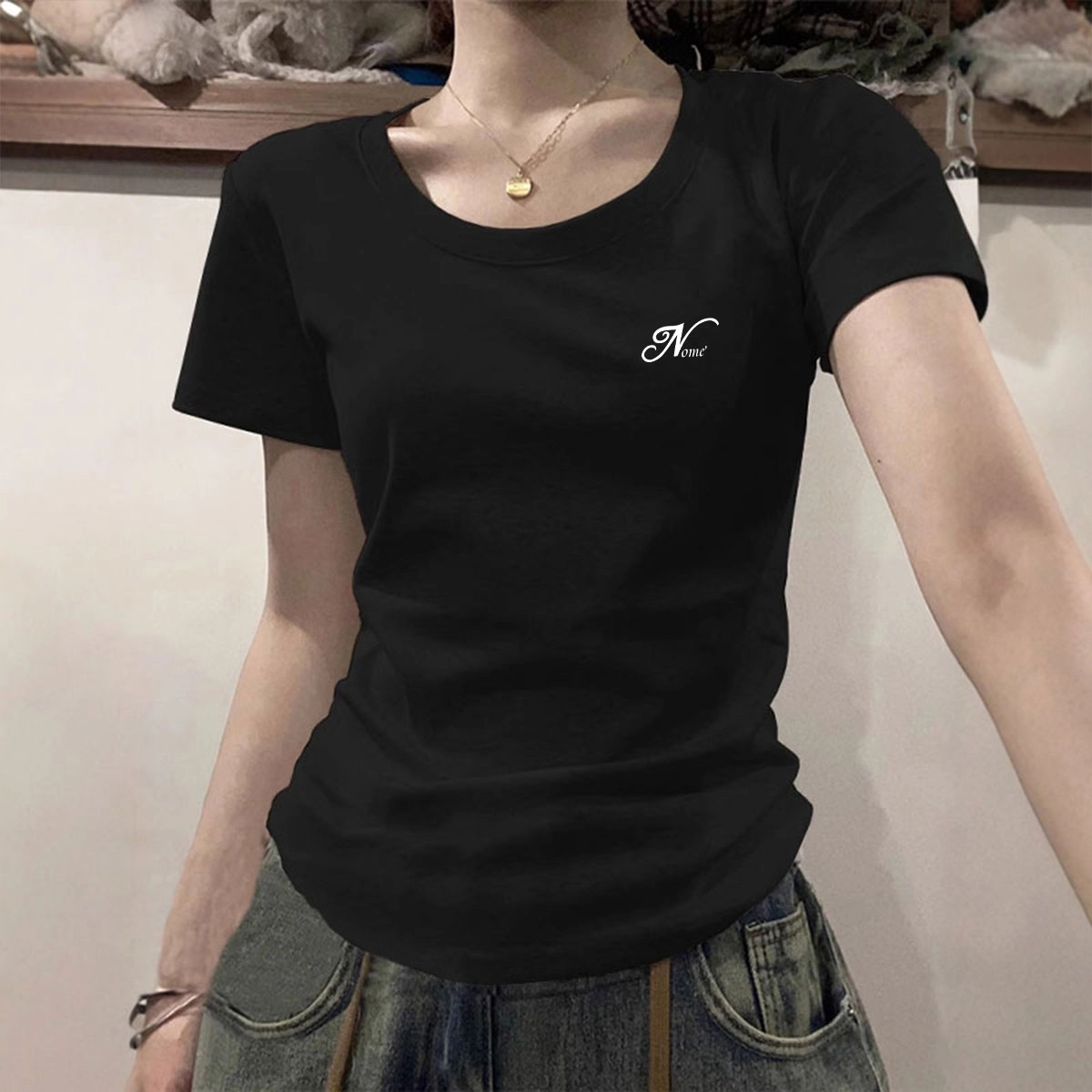 NOME logo T