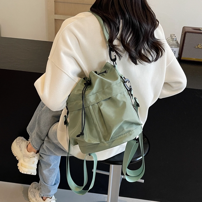 伊曼家 运动风潮流帅气简约时尚小众水桶轻便包包 帆布 帆布包单肩包 女款