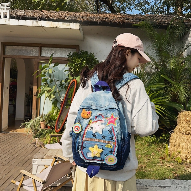 宝琳卡休闲牛仔拼色双肩包卡通甜美中学生书包慵懒风大学生背包女