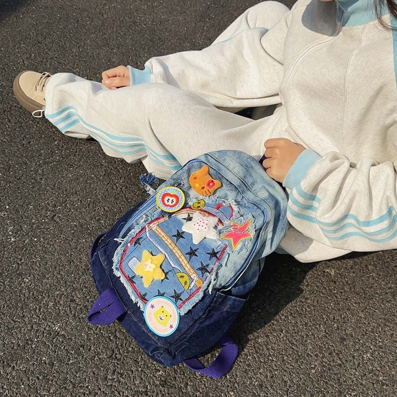宝琳卡休闲牛仔拼色双肩包卡通甜美中学生书包慵懒风大学生背包女