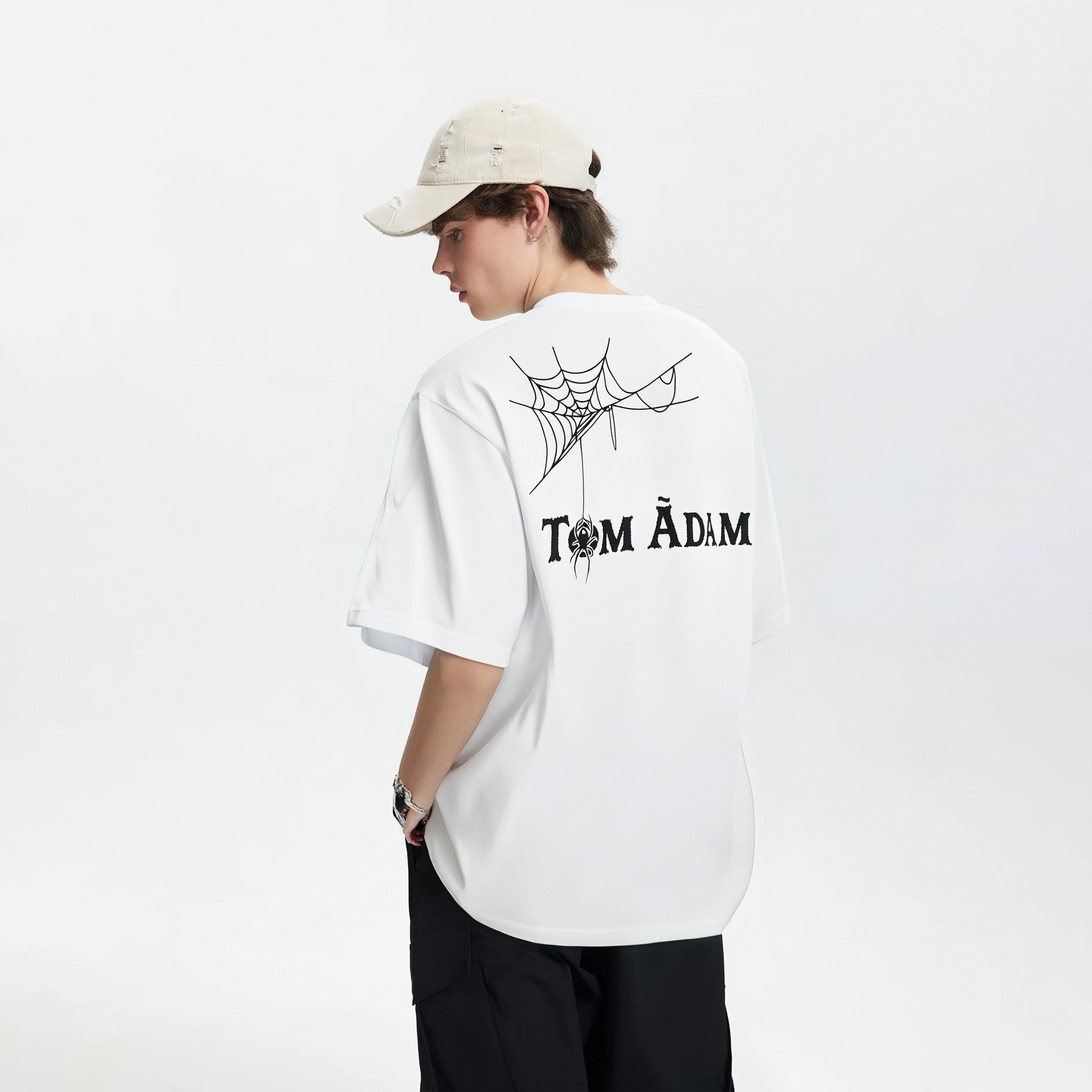 TOM ADAM T