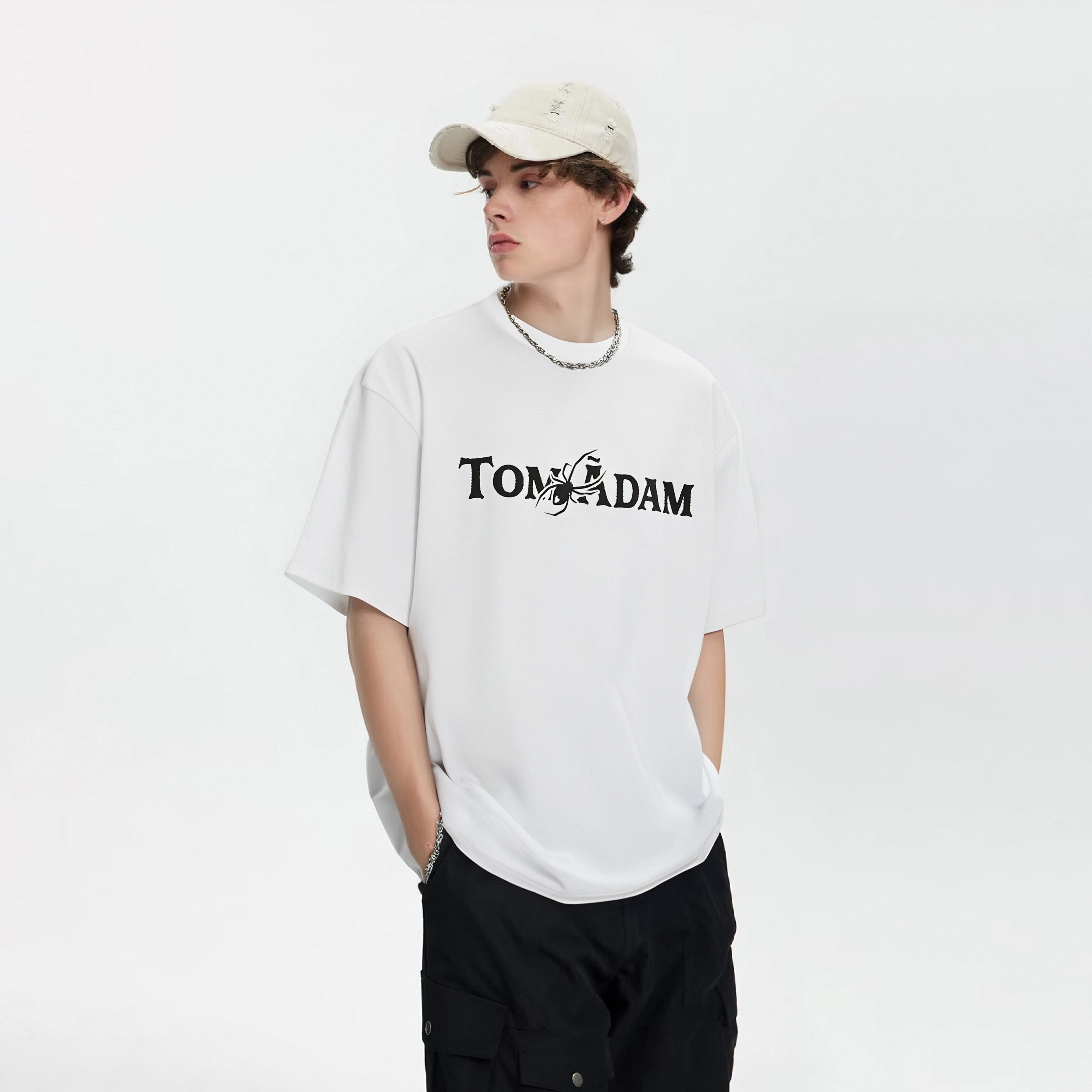 TOM ADAM T