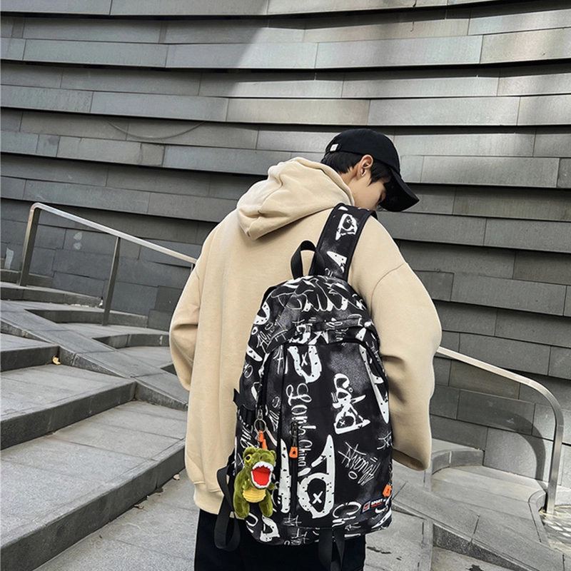 草丛喵喵喵 潮流初中生大学生涂鸦书包 男女情侣同款双肩包 大容量潮酷百搭时尚通勤出行背包尼龙 常规白色/蓝色/灰色/黑色