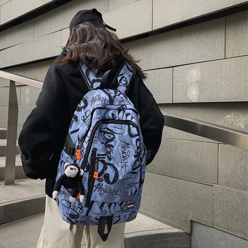 草丛喵喵喵 潮流初中生大学生涂鸦书包 男女情侣同款双肩包 大容量潮酷百搭时尚通勤出行背包尼龙 常规白色/蓝色/灰色/黑色