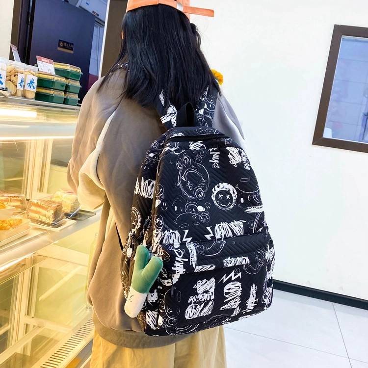 草丛喵喵喵 涂鸦漫画潮酷时尚潮流初高中生出行通勤大容量 尼龙 双肩包 常规 男女同款情侣款 黑配白/白配黑/白配棕/黑配蓝/蓝配白