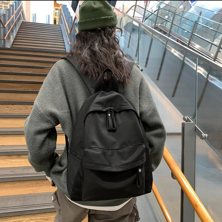 艾妮兔 日系简约百搭初高中大学生休闲通勤 帆布 书包帆布包双肩包 男女同款情侣款 米白色/卡其色/蓝色/黑色
