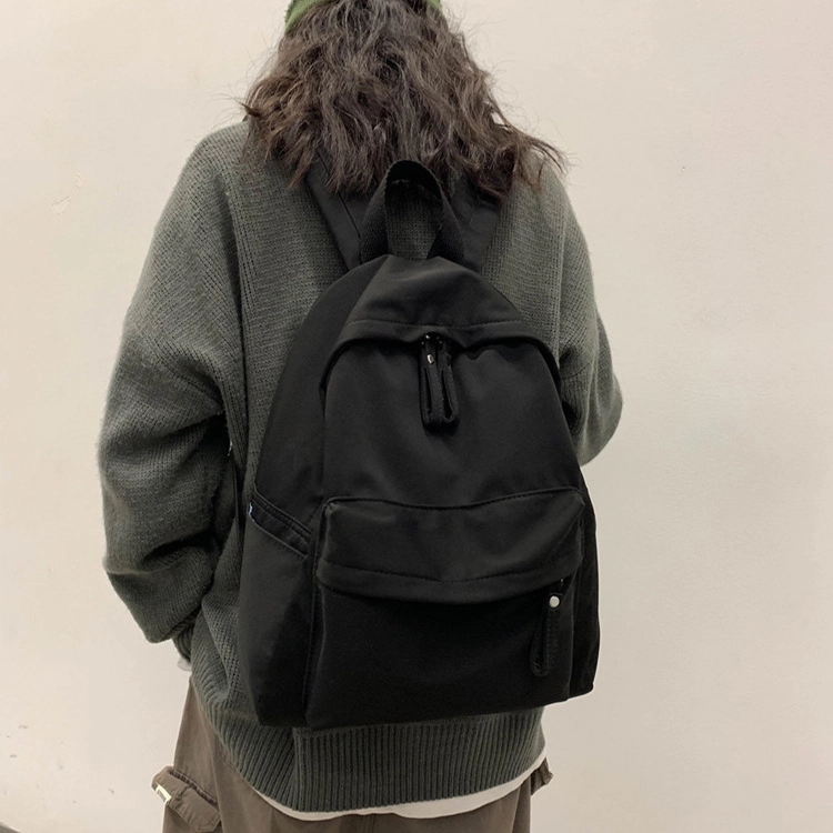 艾妮兔 日系简约百搭初高中大学生休闲通勤 帆布 书包帆布包双肩包 男女同款情侣款 米白色/卡其色/蓝色/黑色