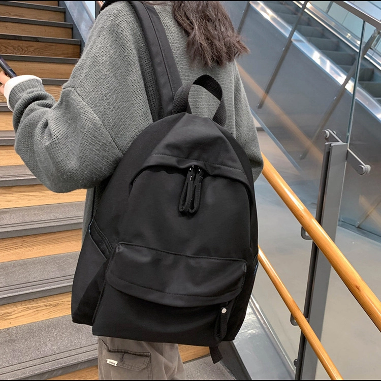 艾妮兔 日系简约百搭初高中大学生休闲通勤 帆布 书包帆布包双肩包 男女同款情侣款 米白色/卡其色/蓝色/黑色