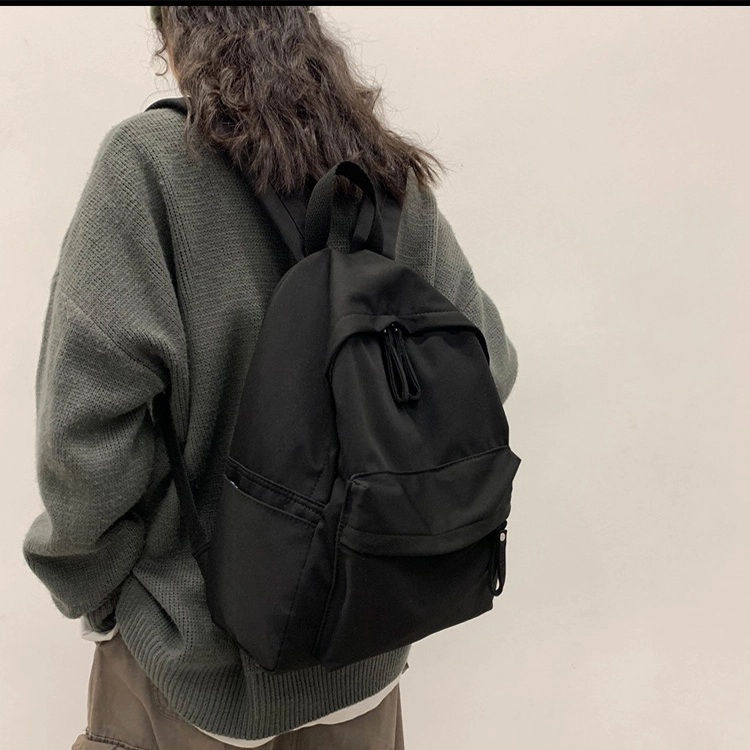 艾妮兔 日系简约百搭初高中大学生休闲通勤 帆布 书包帆布包双肩包 男女同款情侣款 米白色/卡其色/蓝色/黑色