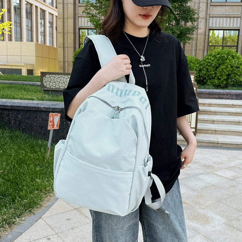 班亚奴 时尚百搭轻便简约 纯色刺绣文艺风背包 初高中大学生上课通勤大容量书包 牛津布 双肩包 男女同款情侣款 黑色/白色/红色/浅蓝色