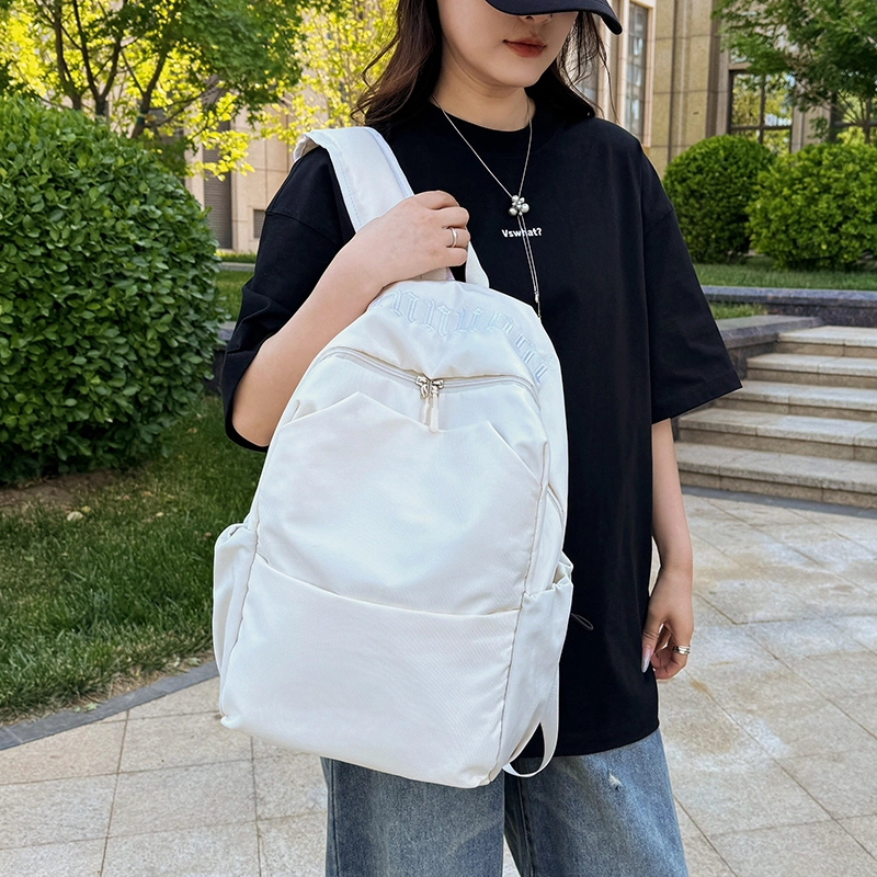 班亚奴 时尚百搭轻便简约 纯色刺绣文艺风背包 初高中大学生上课通勤大容量书包 牛津布 双肩包 男女同款情侣款 黑色/白色/红色/浅蓝色