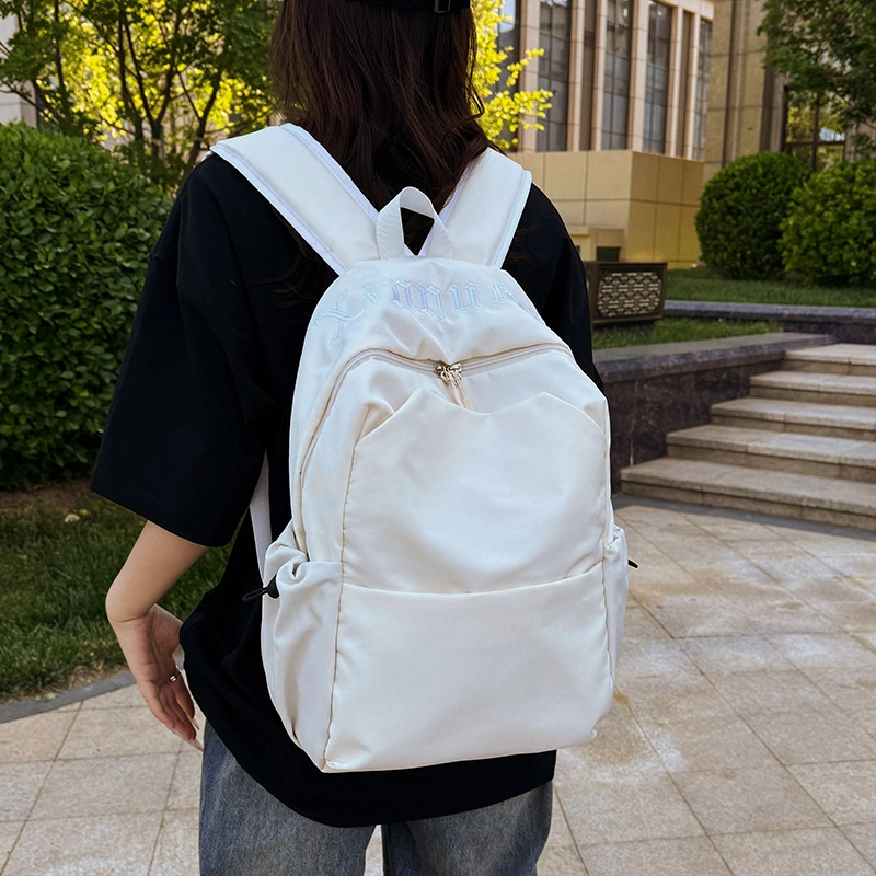 班亚奴 时尚百搭轻便简约 纯色刺绣文艺风背包 初高中大学生上课通勤大容量书包 牛津布 双肩包 男女同款情侣款 黑色/白色/红色/浅蓝色