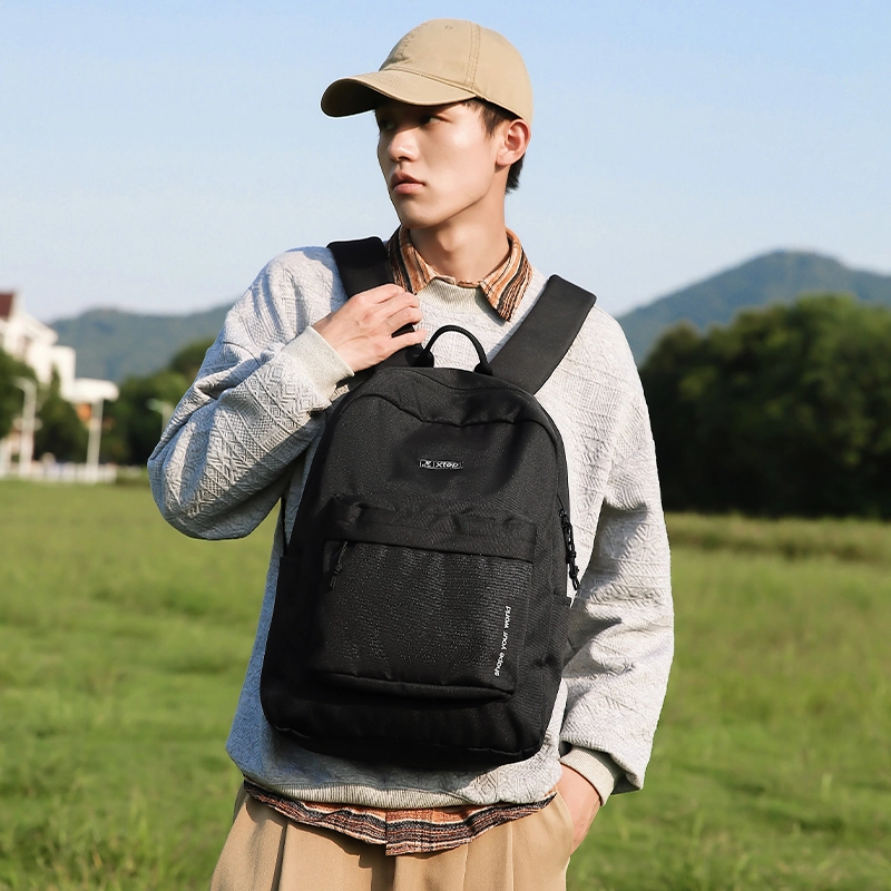 特步 初中高中大学生大容量旅行 聚酯纤维 双肩包 常规 男女同款情侣款 黑色