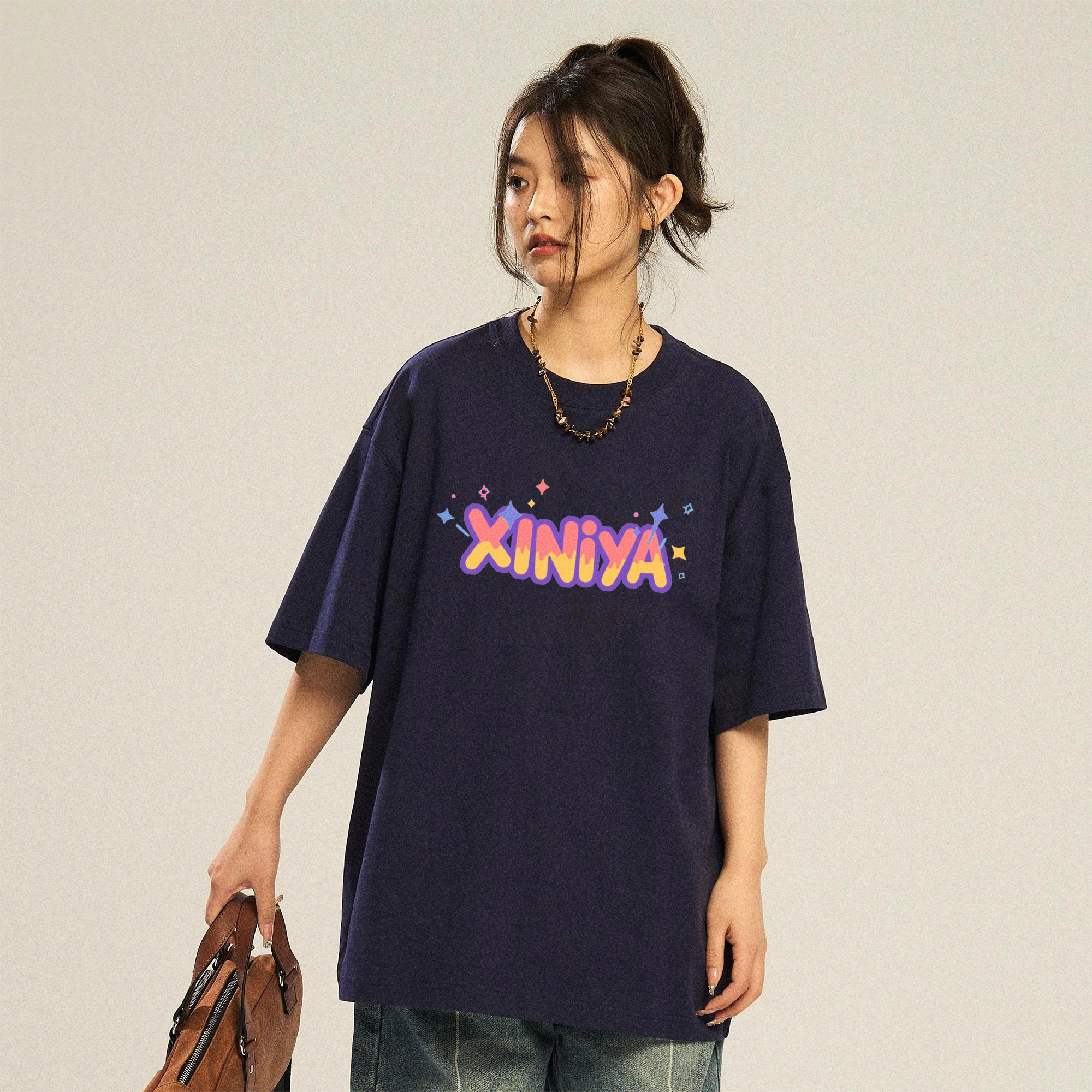 XINIYA TRAVEL logoT