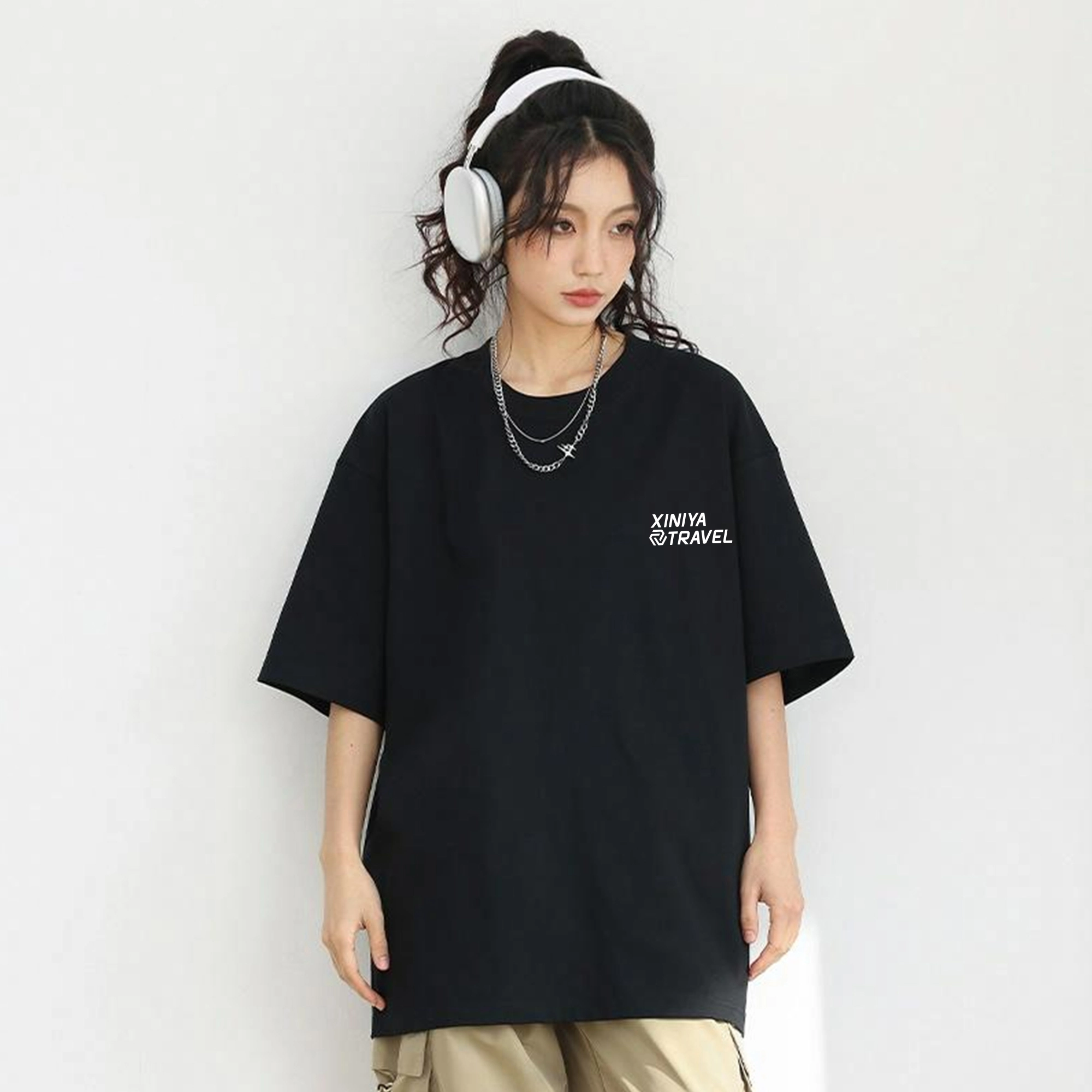 XINIYA TRAVEL LOGOT