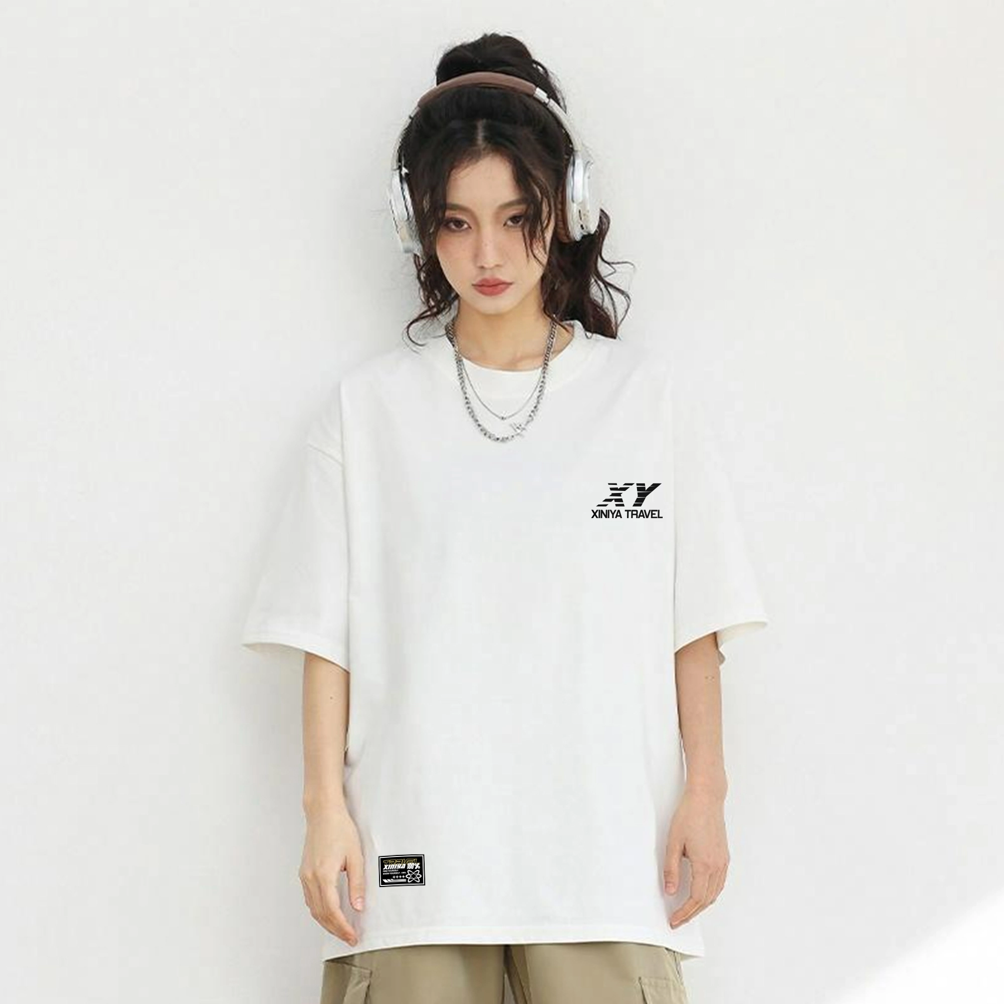 XINIYA TRAVEL LOGOT