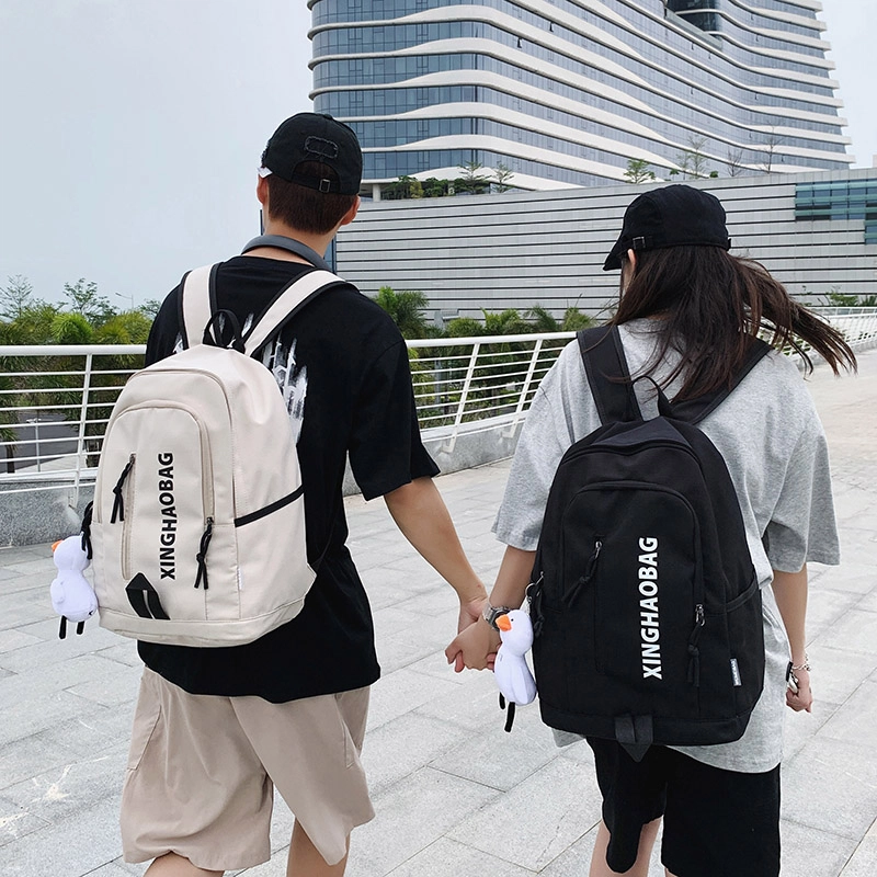 尊梵 休闲简约百搭通勤背包学院风户外 尼龙 双肩包 男女同款情侣款 白色/黑色/紫色/绿色/蓝色/粉色