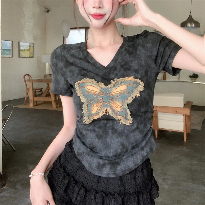 V T