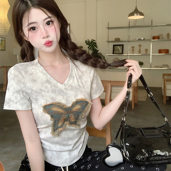 V T