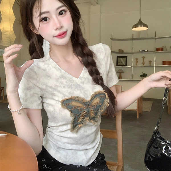 V T