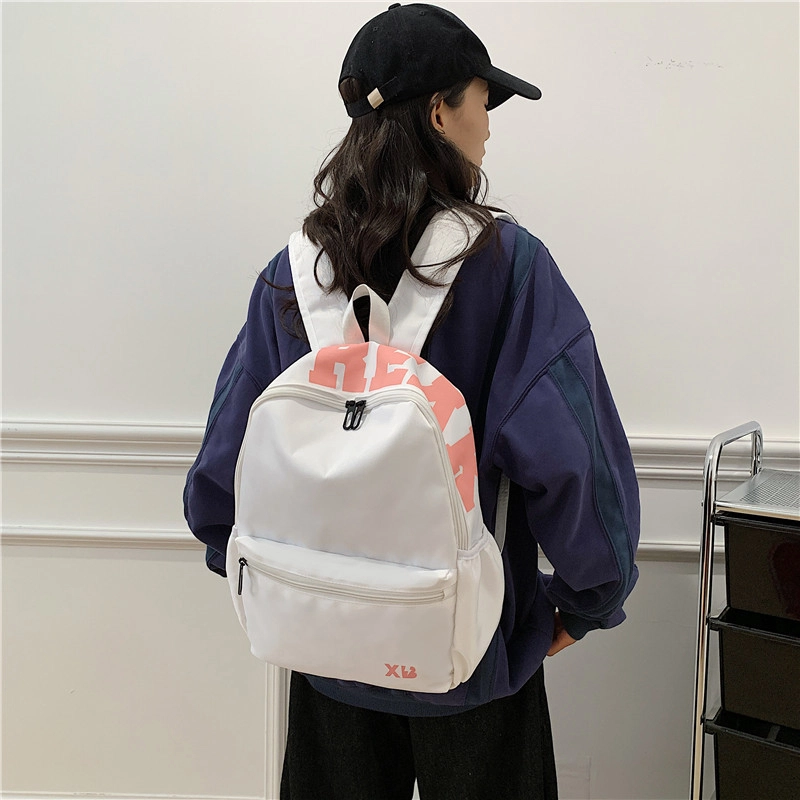 蔻蒂熊 潮流时尚包包小众简约少女书包高颜值女生旅行包高中大学生背包 尼龙布 双肩包 常规 青少年 白色/黄色/蓝色