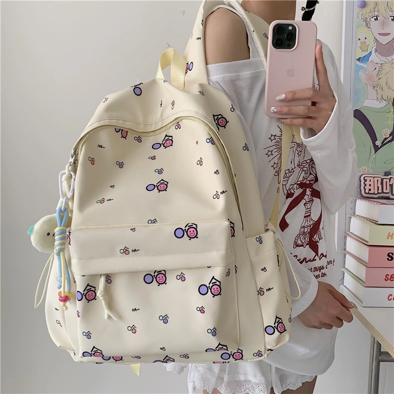單倉 清新可爱卡通碎花设计感轻便耐磨背包初高中学生大容量通勤百搭书包 牛津布 双肩包 常规 男女同款情侣款 白色/黄色/蓝色/粉色